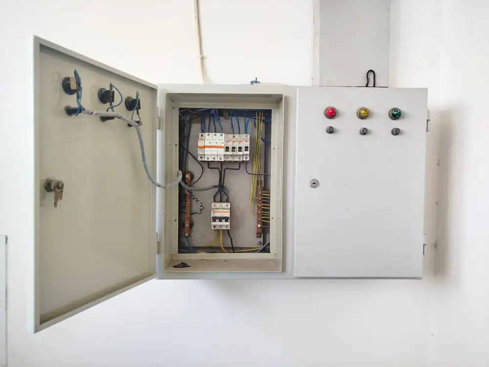 Electrical panel box in a residential setting, located in Cook & Will County, IL, showing clearly labeled circuit breakers and wiring for electrical distribution.
